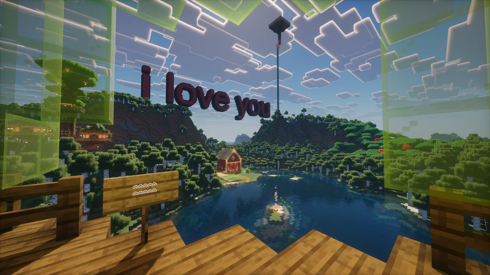 Large love you sign overlooking a forest lake on Manja SMP